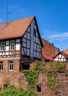 The old town centre with half-timbered houses, church towers and remains of the town wall in