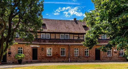 The old castle with Barbarossaplatz and the castle café in the old town centre of Büdingen, Hesse,