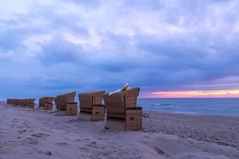 Beach chairs at sunset, North Sea, Rantum, Sylt, Schleswig-Holstein