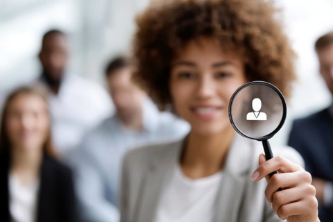 Concept of a brain hunter human resources in search of talented professionals for corporate office