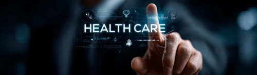 Businessman touching a digital, glowing, futuristic, modern hologram with the text HEALTHCARE and