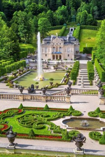 Baroque gardens at the Temple of Venus with a view of the water parterre and Linderhof Palace,