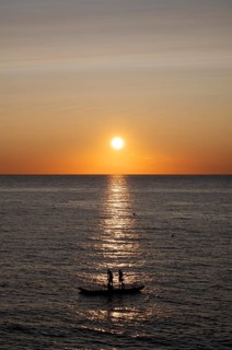 Children playing on bathing island, bathing raft, swimming island, Étretat, sea, sunset, evening