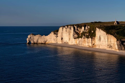 Rock arch Falaise or Porte d'Amont, beach, church Chapelle Notre Dame de la Garde, Étretat, sea,