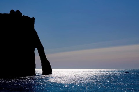 Rock arch Falaise or Porte d'Aval against the light, silhouette, Étretat, sea, cliffs, cliffs,