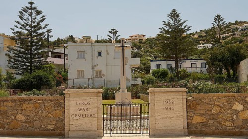 Entrance to Leros War Cemetery with inscriptions and tall trees, Military Cemetery, Commonwealth