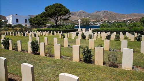 Cemetery with gravestones and sea view, surrounded by trees and mountains, Military Cemetery,