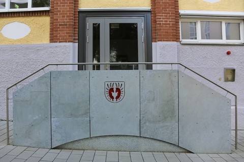 New town hall in the former Kindler corset factory, historical coat of arms of the Lords of