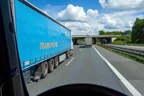 Overtaking manoeuvre by articulated lorry, lorry overtaken, A3 motorway near Nuremberg, Middle