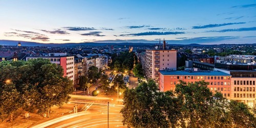 Residential and office building on Kaiser-Friedrich-Ring in the city centre at night, Wiesbaden,