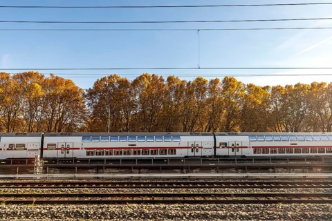 InterCity entering Stuttgart Central Station in autumn. Apron of the track. Stuttgart,