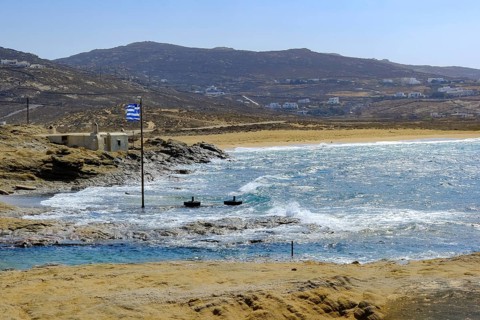 Mykonos, Cyclades, Greece - Ftelia Beach, Ftelia Beach, sandy beach on a windy rocky coast in the