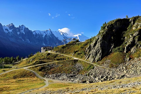 Mountain station of the La Flégère cable car, with the snow-covered Mont Blanc massif at the back,