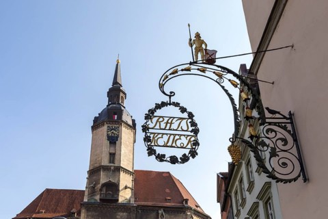 Ratskeller nose sign, in the background the tower of St. Wenzel City Church, Naumburg (Saale),