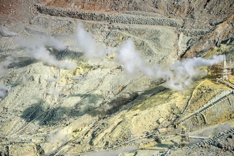 Steaming fumaroles in the Owakudani geothermal area at Komagatake volcano, Hakone, Japan