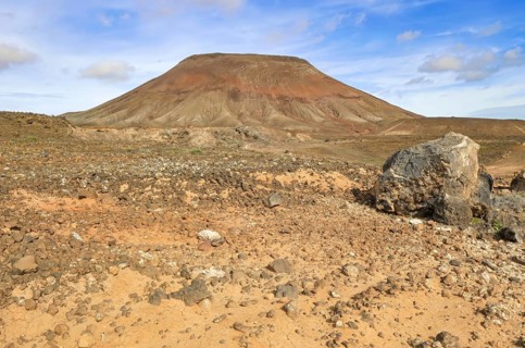 View of eroded volcano volcanic cone partially eroded by erosion in volcanic landscape Volcanic