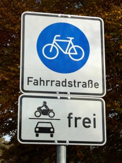 Above road sign 244.1 bicycle road at the beginning of a road intended for cycling, including