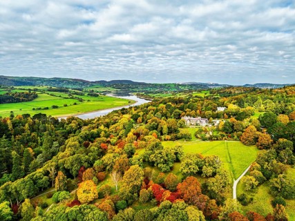 Autumn colours over Bodnant House and Garden from a drone, Conwy River, Colwyn Bay, Conwy, Wales,
