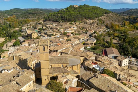 Church tower and rooftops of medieval village of Uncastillo, Cinco Villas, Zaragoza province,