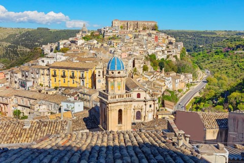 Elevated view of the church of Santa Maria dell'Itria and Ragusa Ibla in the distance, Ragusa Ibla,