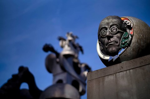 Head, sculpture in front of Villa Visconti, also House of Heads, behind Tower of the Grey Horses by