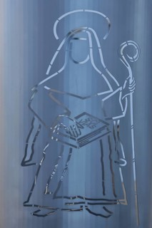 Monument with figure of Hildegard of Bingen with bishop's staff, crook, stainless steel, sheet