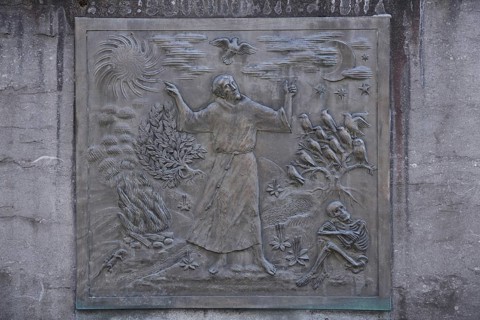 Relief of Saint Francis, Francis of Assisi, monk, monochrome, grey, skeleton, death, bird figures,