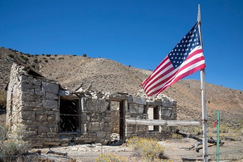Austin, Nevada - A flag flies beside the ruins of the Walters station on the Nevada Central