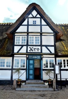 Danish inn, restaurant, in typical half-timbered house with thatched roof on Funen, Fyn island,