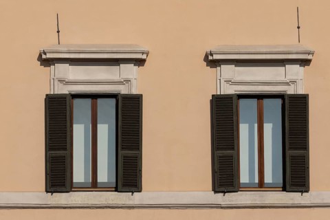 Windows of a building in the city of Rome, Italy