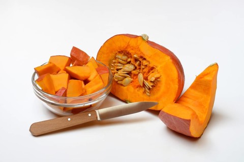 Hokkaido pumpkin, sliced with a knife