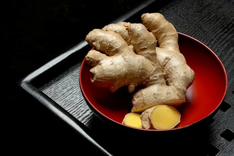 Ginger, ginger root in tea bowl, Zingiber officinale, tea preparation