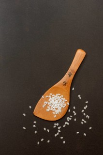 Rice grains with cooking spoon, rice