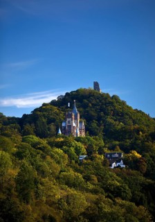 The mountain Drachenfels with Drachenburg Castle and the castle ruins, Siebengebirge, Königswinter,