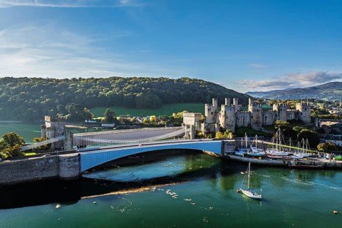 Conwy Castle over River Convy from a drone, Convy, North Wales, England, United Kingdom
