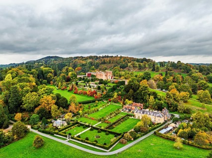 Autumn colours over Powis Castle and Garden from drone, Welshpool, Powys, Wales, England, United