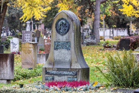 Honorary grave of poet Eduard Mörike. Pragfriedhof Stuttgart in autumn. November is traditionally a