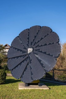 Smart Flower, a sculptural, free-standing all-in-one solar system whose solar modules unfold like a