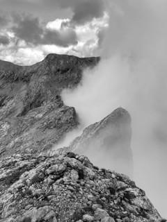 View from the summit of Wildalmkirchl with fog on the southern edge of the Steinernes Meer,