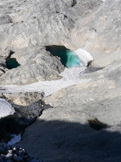 Glacier lake and remnants of the Übergossene Alm glacier on the Hochkönig, symbol of glacier