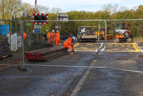 Road and rail level crossing closed, Network Rail railway line upgrade maintenance, Melton,