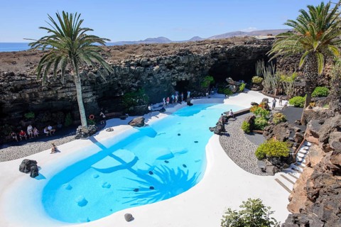 View from elevated position of pool designed by César Manrique Swimming pool in art venue cultural