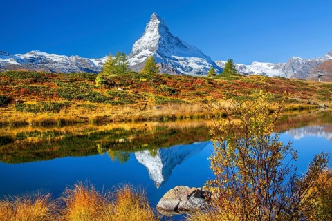 Matterhorn 4478 m with reflection in Leisee on the Sunnegga in autumn, Zermatt, Mattertal, Valais,