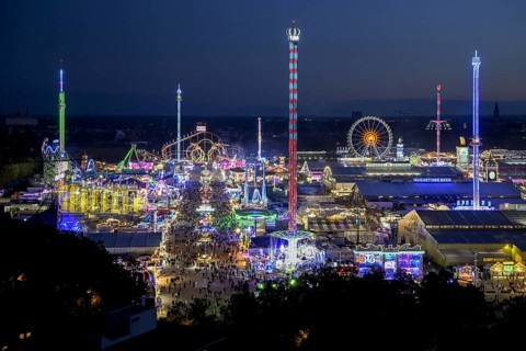 View of Oktoberfest from St. Paul's Catholic Church, Blue Hour, Munich, Bavaria, Germany