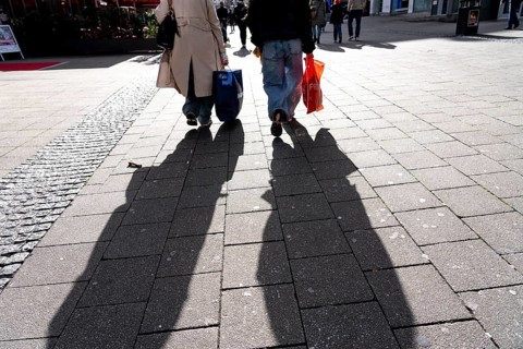 Shadows of passers-by shopping in the city center, Essen, North Rhine-Westphalia