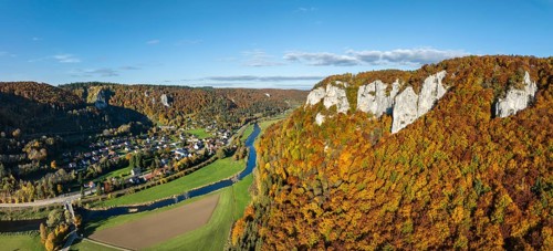 Aerial view, panorama of the Upper Danube Valley, surrounded by autumn vegetation with the