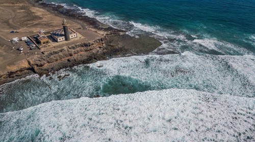 Aerial view of Faro Punta de Jandia lighthouse at the southern tip of Jandia peninsula, in the