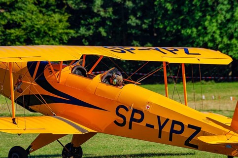 A biplane Bücker Bü 131 Jungmann with registration SP-YPZ during a flight demonstration as part of