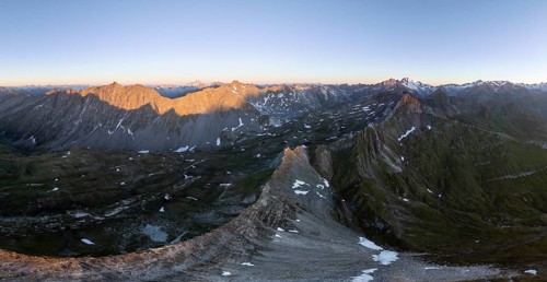 Sunrise 360° Alpine panorama, aerial view of Bachlenkenkopf, summit of the Großvenediger, Venediger