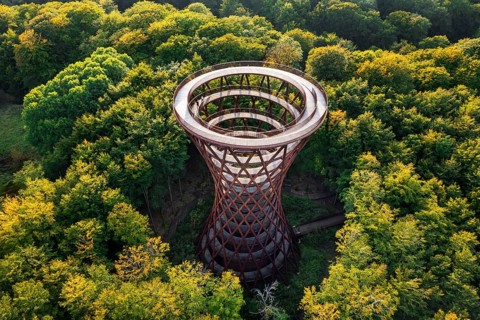 Aerial view over 45-meter-tall hyperboloid observation tower in forest near Gisselfeld monastery at